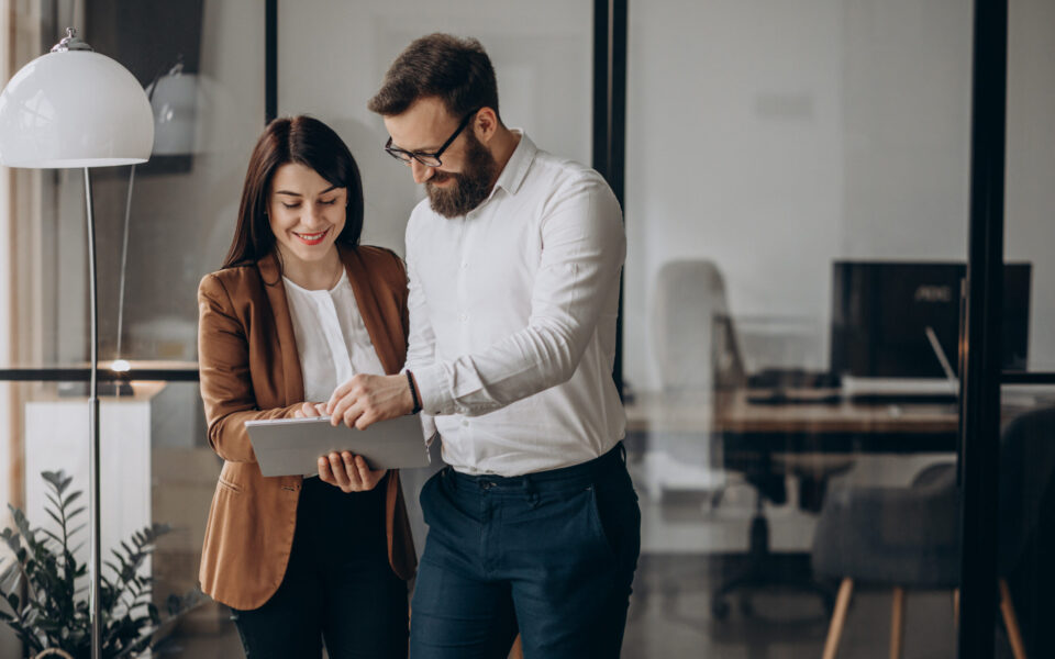 Two business partners working in office